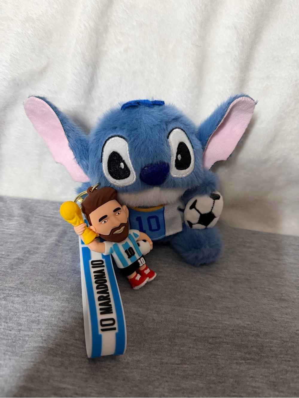 Blue Stitch Plush Holding Soccer Ball Keychain